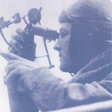 A close-up of a man looking through a binocular
