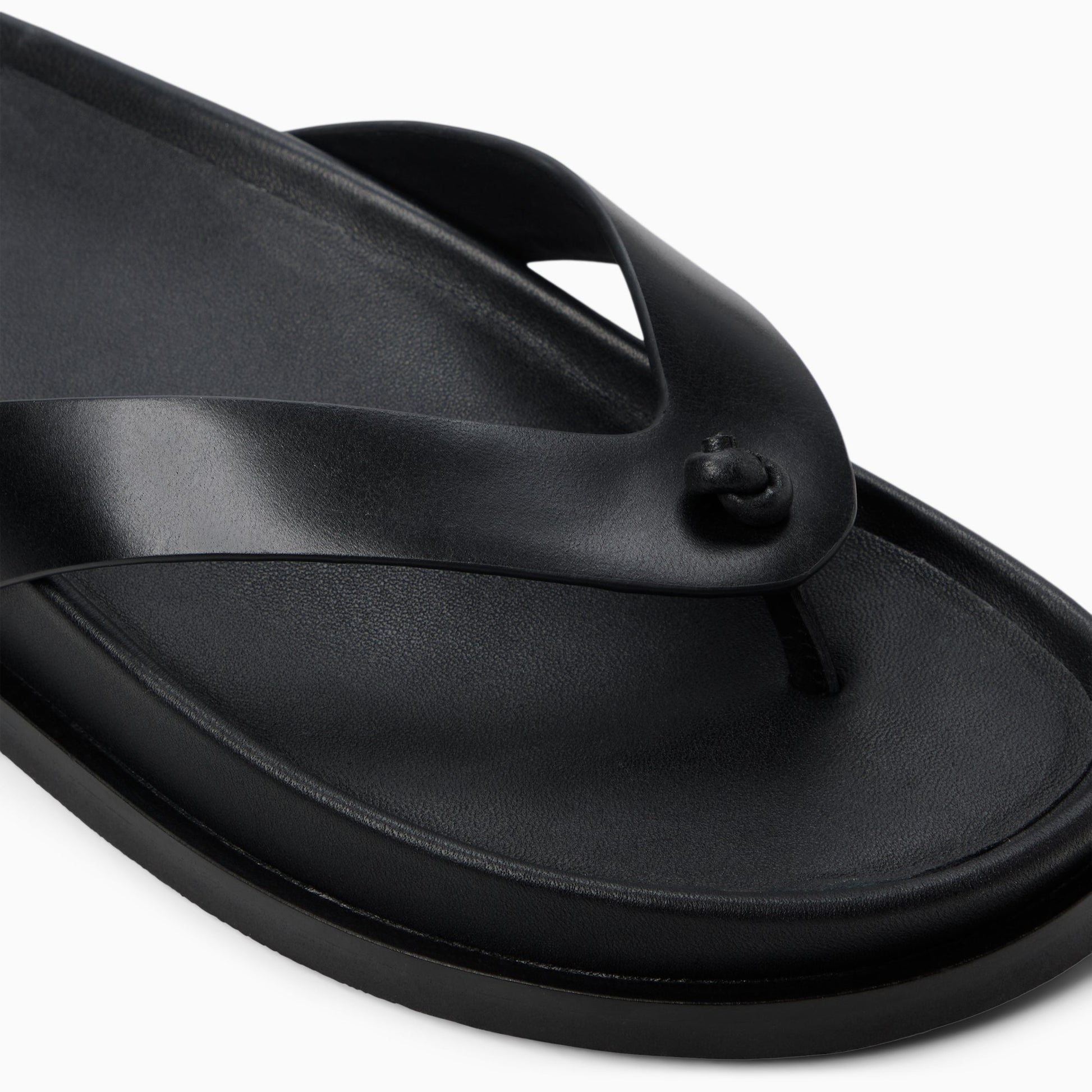Top-down view of the Black Womens Wynn Footbed Thong Sandal Footbed Thong Sandals