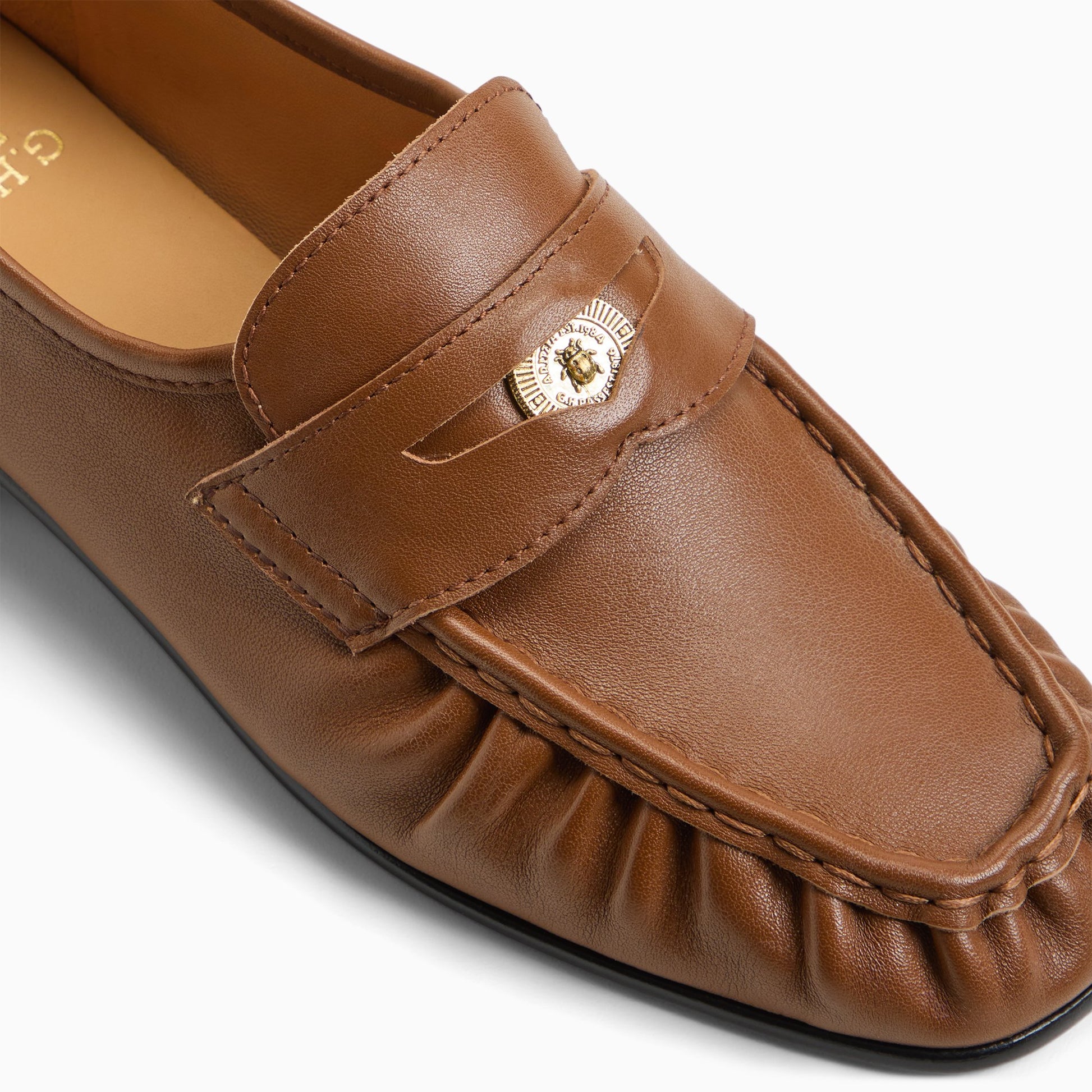 Top-down view of the Brown Womens G.H.BASS x Aritzia Milton Coin Penny Loafer Penny Loafers